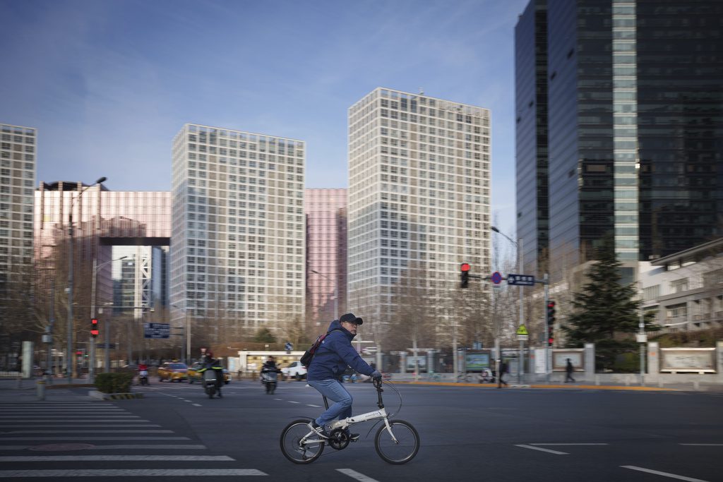 Chinese manufacturers reported an uptick in orders in February as importers rushed to beat higher U.S. tariffs imposed by President Donald Trump, as a Chinese state media report said that Beijing was considering ways to retaliate-- AP photo