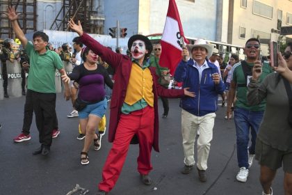 Peruvian activists stage demostration demdning ouster of its interior minister - AP photo