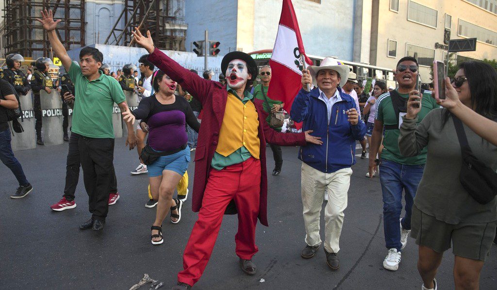 Peruvian activists stage demostration demdning ouster of its interior minister - AP photo