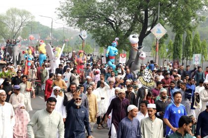 Residents in Dhaka brought out a procession carrying various figures and sculptures on the eve of the Eid-al-Fitr - Focus Bangla photo