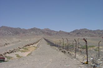 Iran Pakistan border divided with barbed wires.