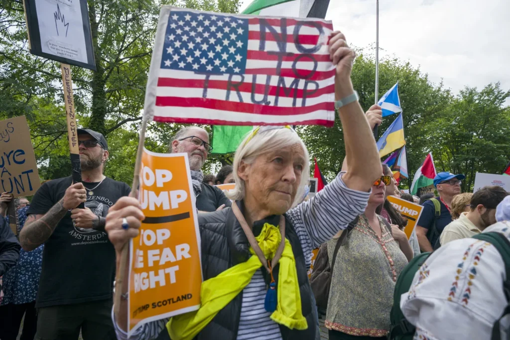 Trump plays golf in Scotland while protesters take to the streets and decry his visit Trump on Scotland