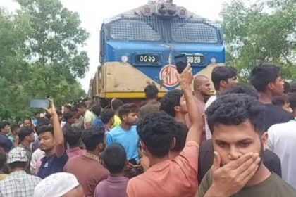 train rams into auto