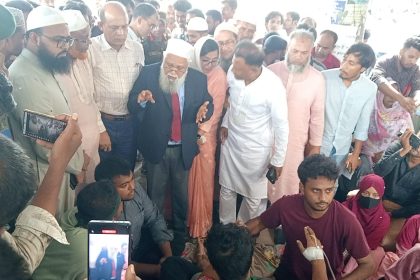 Protestors demand health adviser
