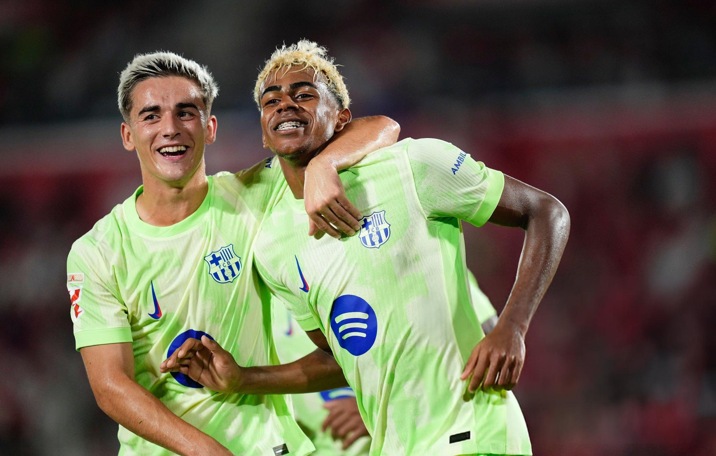 Barca begin title defence with commanding win at Mallorca
