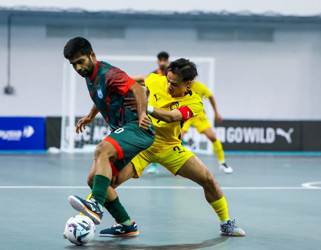Bangladesh celebrate first futsal goal as Malaysia run riot
