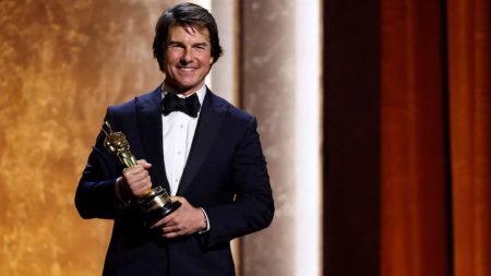 Tom Cruise touts the power of cinema as he accepts honorary Oscar