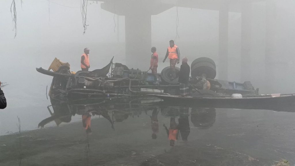 truck plunges into river