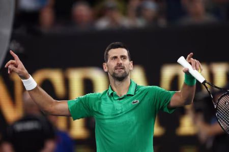 Djokovic reaches last eight as Mensik withdraws injured