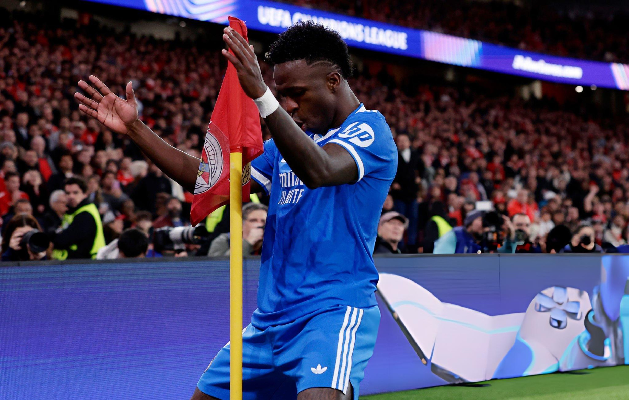 Vinicius fires Madrid ahead against Benfica in game marred by racial abuse