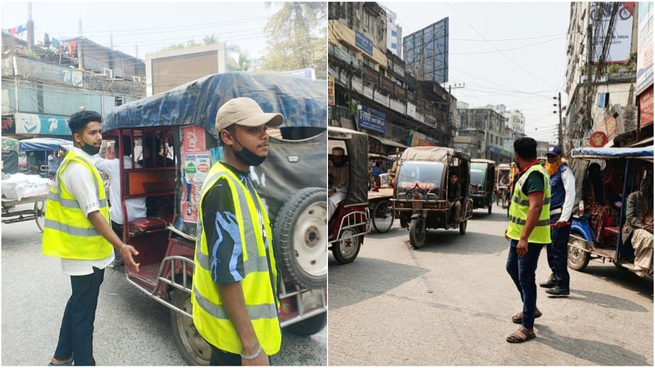 Volunteer working to eases traffic in Tangail ahead of Eid