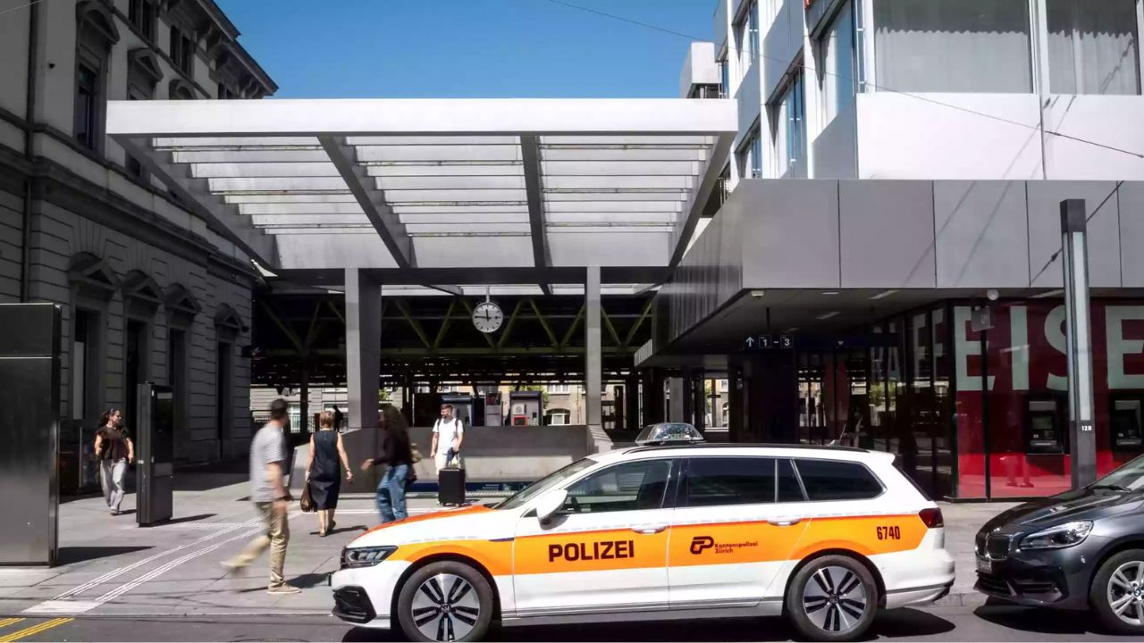 Man held after stabbing three at Swiss train station