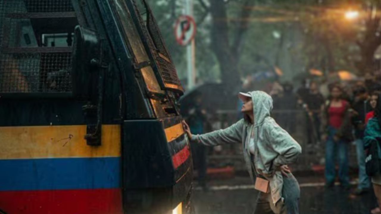 woman block police van