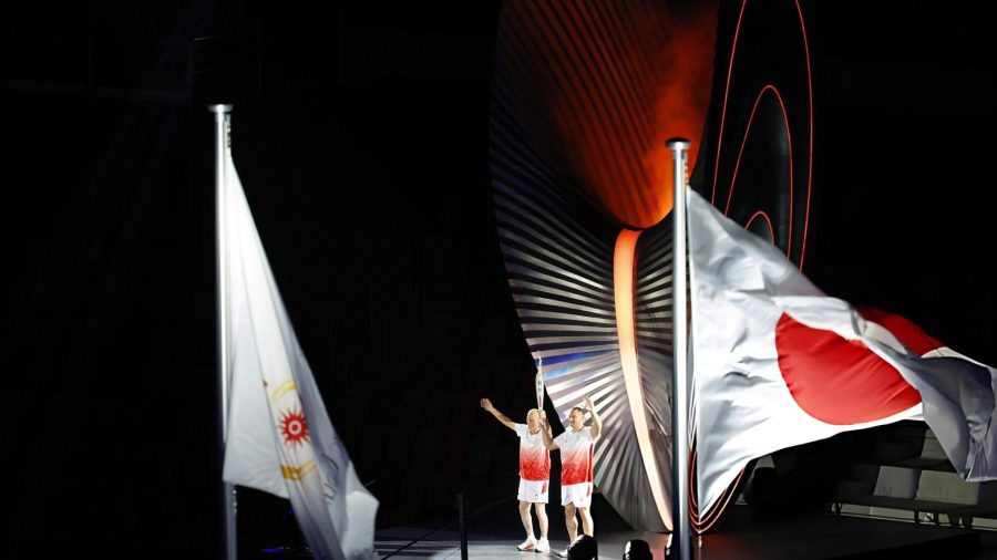 Japan opens Asian Games amid typhoon threat and complaints