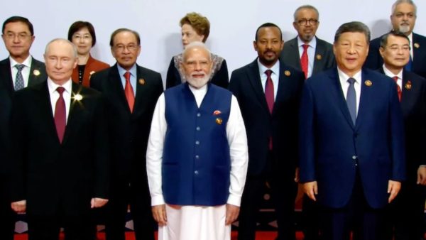 Modi flanked by Putin, Xi in Brics family photo
