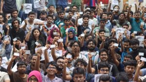 CUET students march with IDs, Sayem’s photo on 8th day of protest