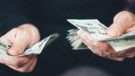 BB tests dollar market rate through auction