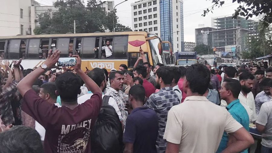 Stand-off at Mohakhali: Transport workers block road over bus impounds, fines