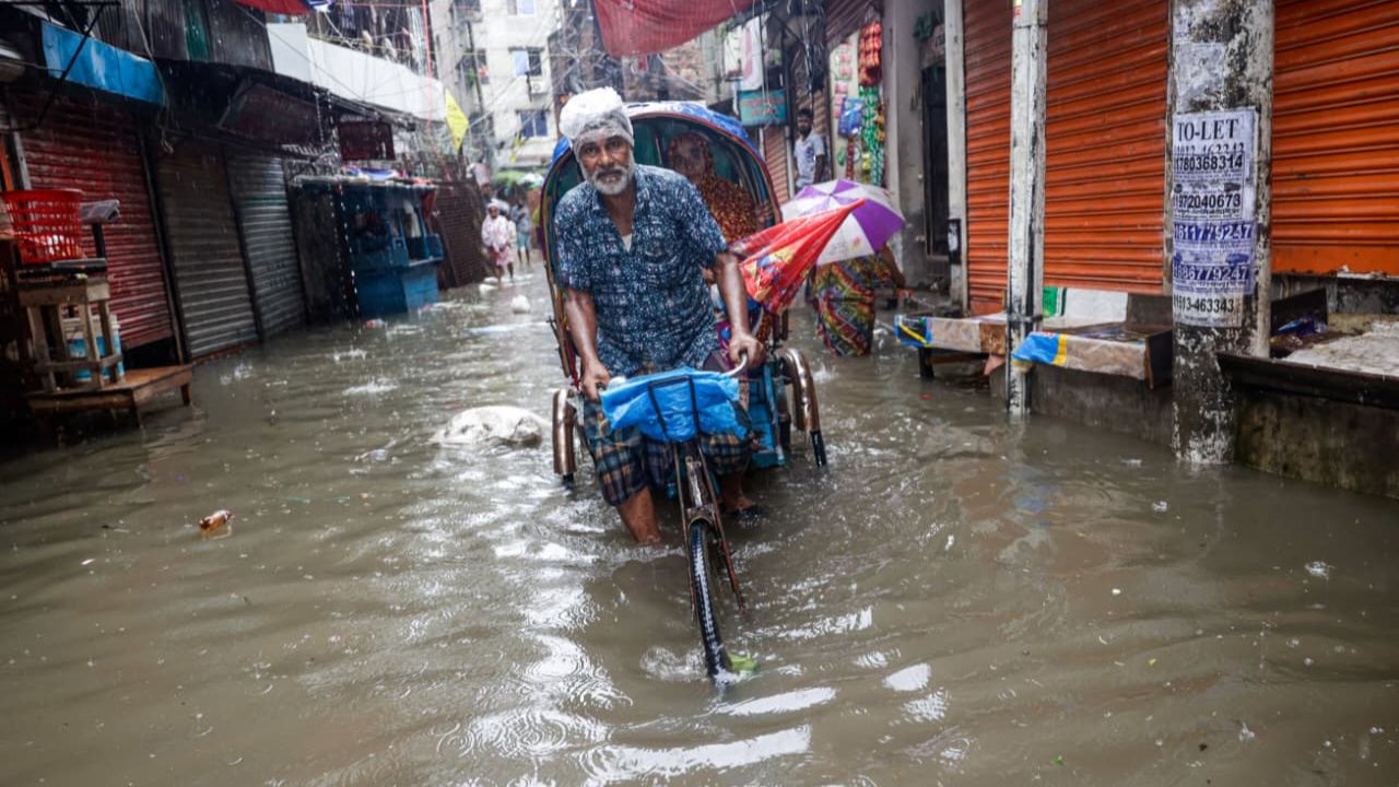 In photos: Heavy rain brings traffic woes, waterlogging in Dhaka