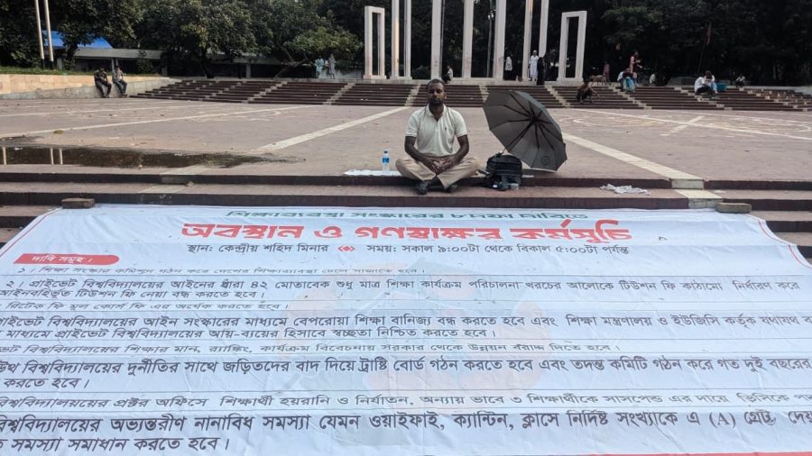 Eight-point education reform demands: Student stages solo protest at Shaheed Minar