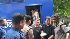 Six Chinese, Taiwanese held in cyber fraud case sent to remand