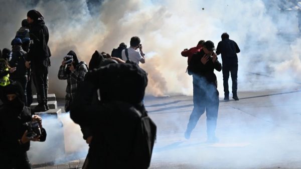 Fires, tear gas and arrests rock France as its anger boils over