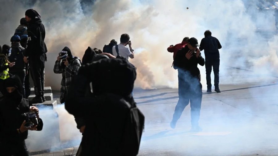 Fires, tear gas and arrests rock France as its anger boils over