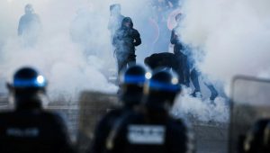 France suspends stun grenade use after teen loses hand in protests
