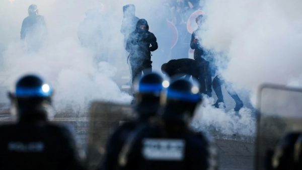 France suspends stun grenade use after teen loses hand in protests