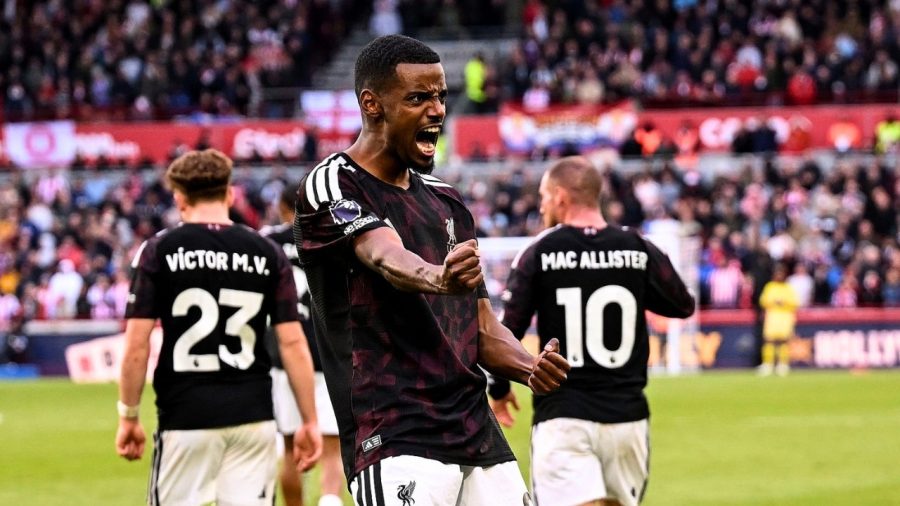 Isak fires Liverpool past nine-man Brentford