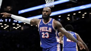 James shines in pre-season debut for re-tooled 76ers