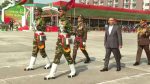 PM presents national flags to army personnel