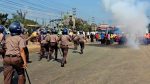 Police use sound grenades to disperse garment workers
