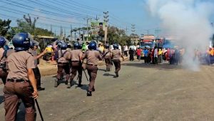 Police use sound grenades to disperse garment workers