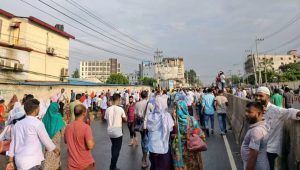 Wage protests shut 50 factories as workers battle police
