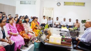 Milestone College principal exchanges Durga Puja greetings